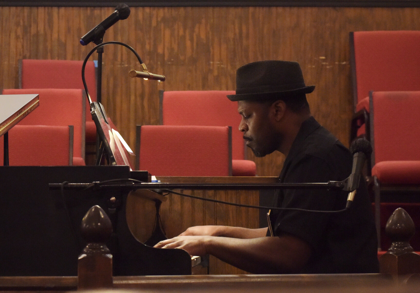 Reginald R. Robinson plays the piano